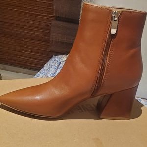 Cognac heeled boots by Steve madden